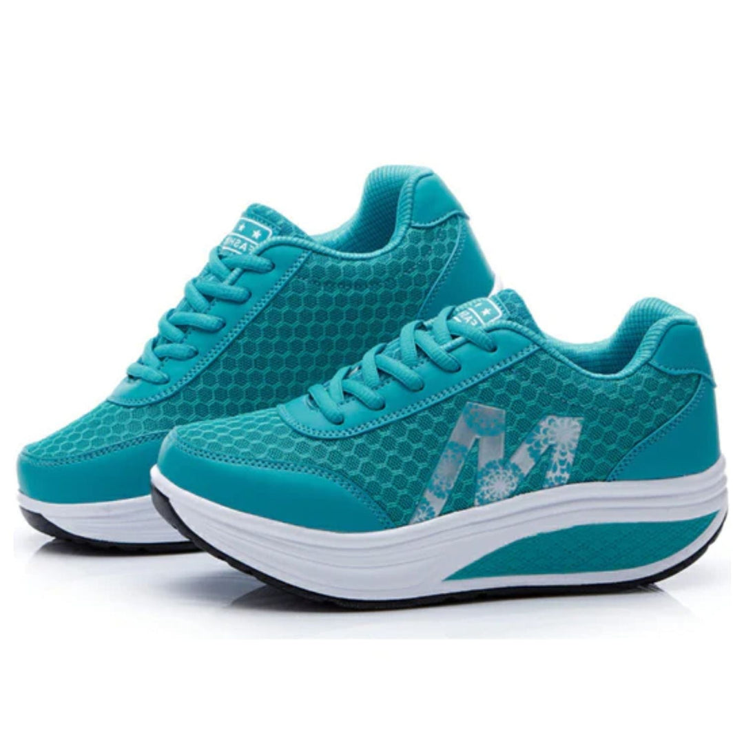 Türkise Sportschuhe mit gepolsterter Sohle, atmungsaktiv, ideal für Damen, Fitness, Laufen.