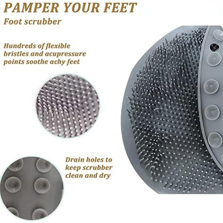 Grauer Silikon-Fußschrubber mit flexiblen Borsten und Abflusslöchern für Peeling und Massage.