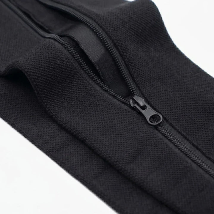 Detailní záběr na zip a pletený materiál černé podkolenky s vnitřním ochranným lemem 12