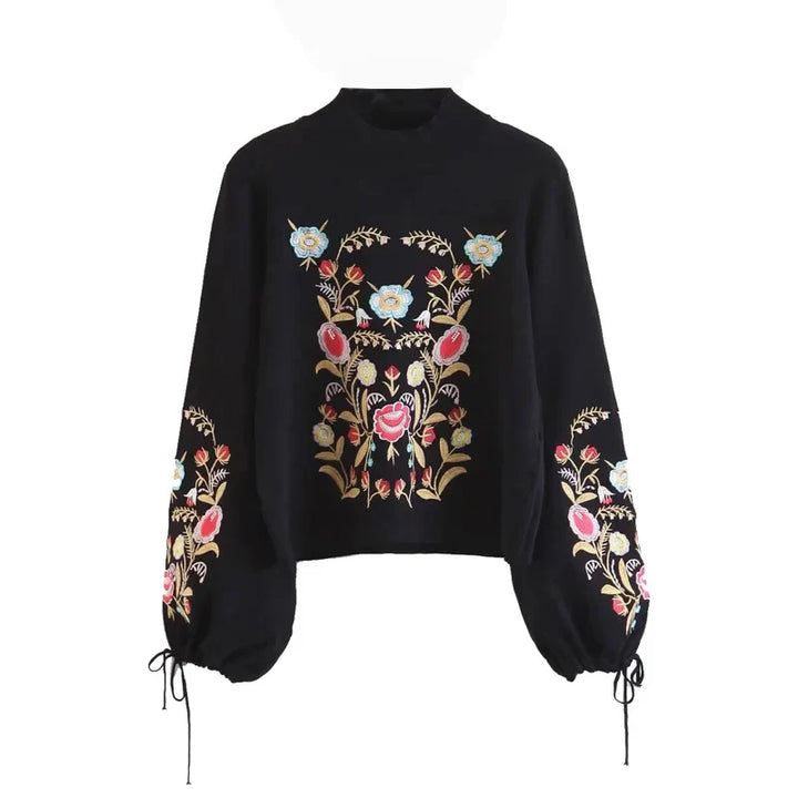 Schwarzer Damenpullover mit floraler Stickerei, Vintage-Stil, langarm, Rollkragen.