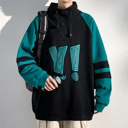 Schwarzer Hoodie mit grünen Ärmeln, grafischem Print, Knopfleiste, lässiger Stil.