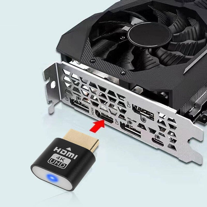 Černý HDMI adaptér se šipkou ukazující na HDMI výstup na grafické kartě s ventilátorem. 9