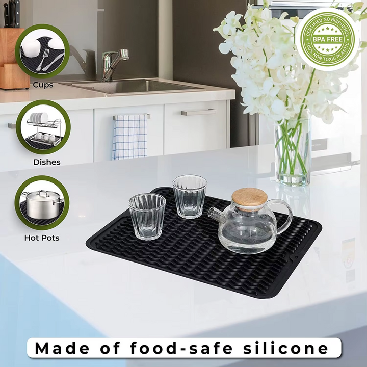 Schwarze Silikon-Abtropfmatte für Küche, BPA-frei, hitzebeständig, ideal für Geschirr und Töpfe.