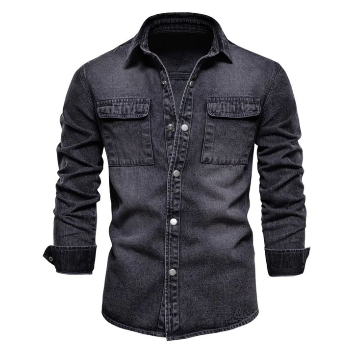 Schwarzes Jeanshemd für Herren, langärmelig, Knopfleiste, zwei Brusttaschen.