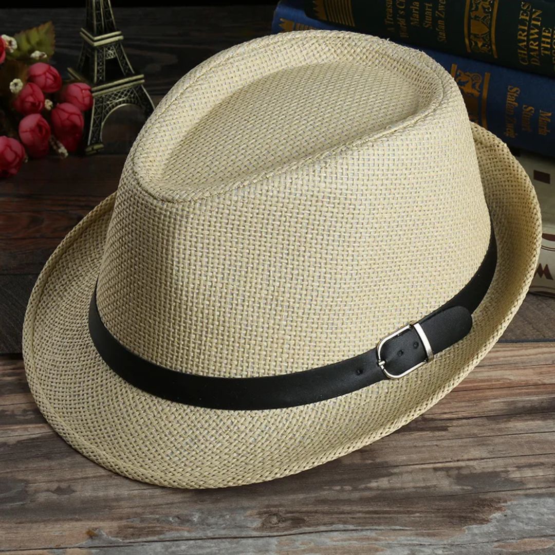 Beiger Strohhut mit schwarzem Band, klassisches Design, ideal für Sommermode und Sonnenschutz.
