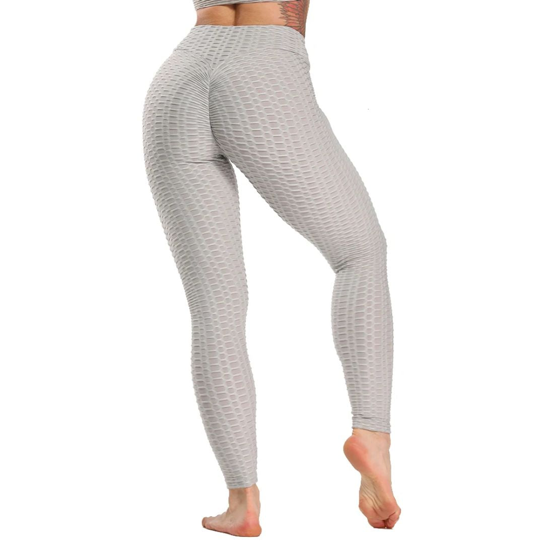 Graue nahtlose Leggings, strukturierte Oberfläche, Damen-Sportbekleidung, hohe Taille.