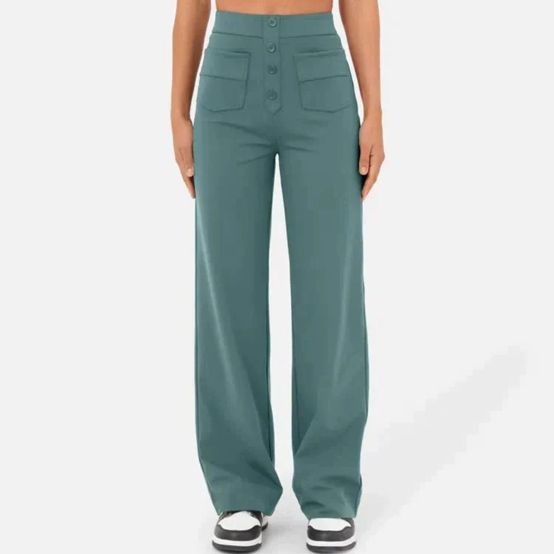 Frau in grüner, weiter Hose mit Knöpfen und Taschen, modisch, bequem, Damenbekleidung.