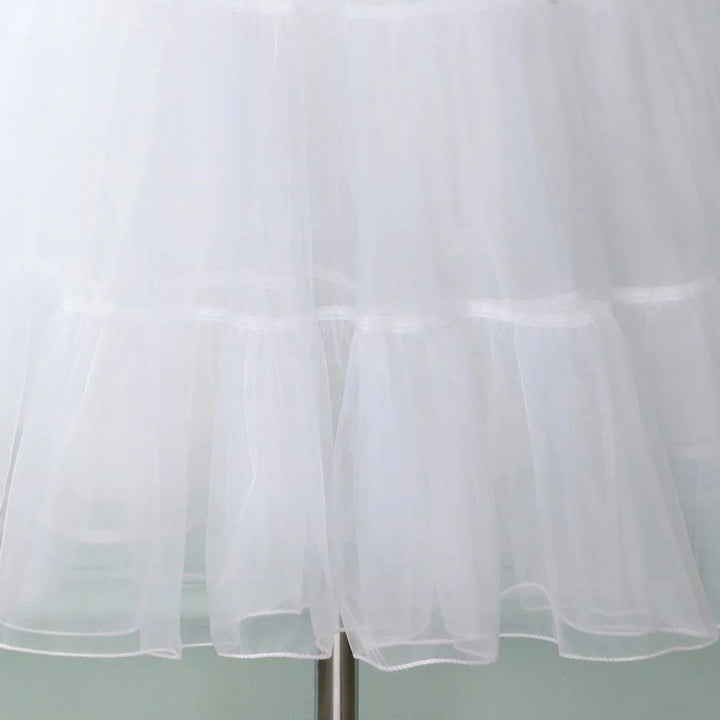 Weißer Tüllrock, mehrlagig, elegant, für Damenmode, ideal für Hochzeiten und besondere Anlässe.