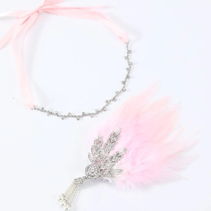 Rosa Federkopfschmuck mit Strasssteinen, elegantes Accessoire für Hochzeiten und Partys.