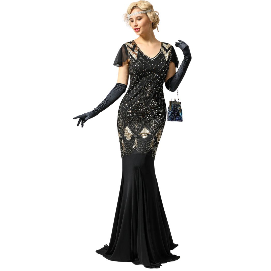Frau im eleganten schwarzen Abendkleid mit Pailletten, langen Handschuhen und Handtasche.