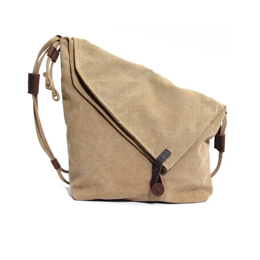 Beige Umhängetasche aus Segeltuch mit Lederdetails, lässig, modisch, ideal für den Alltag.