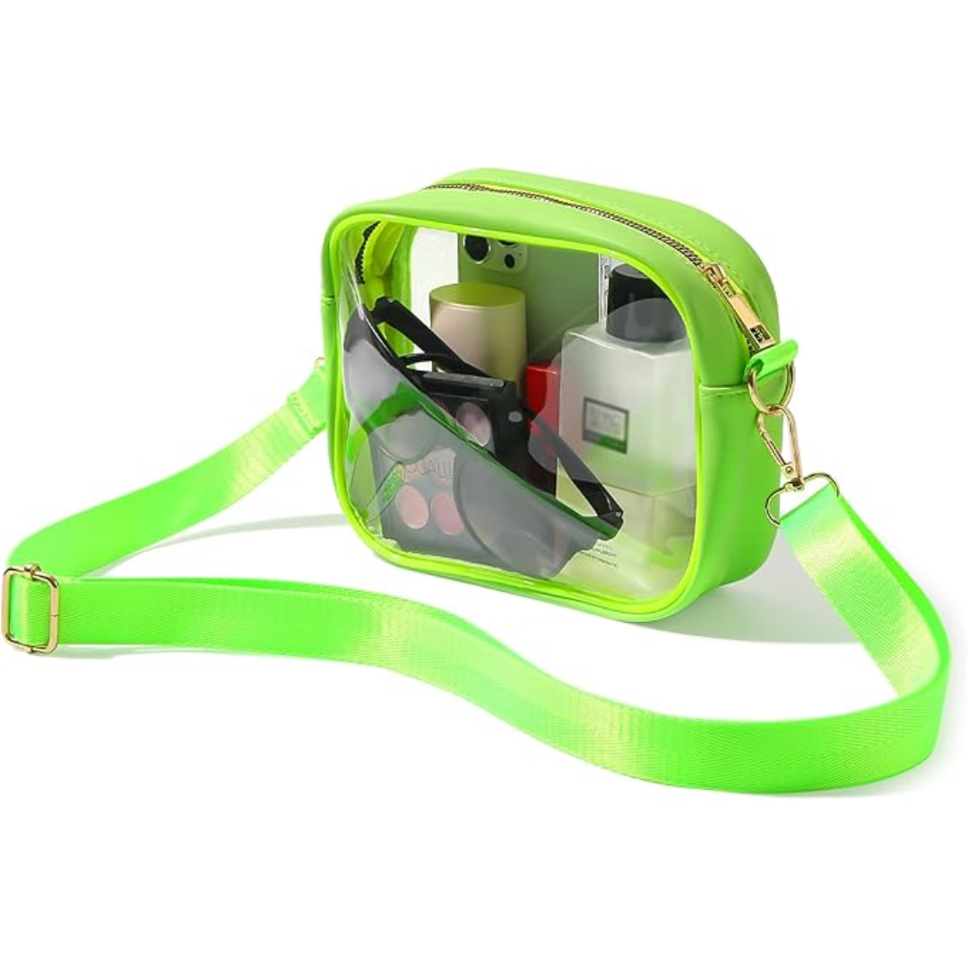 Neon-grüne transparente Umhängetasche, ideal für Reisen, mit Kosmetik und Sonnenbrille.