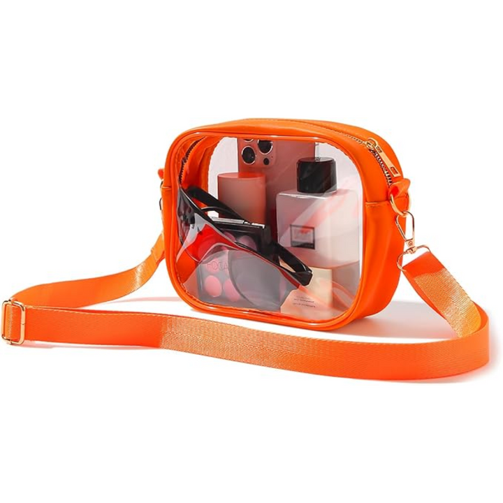 Orange transparente Umhängetasche, PVC, mit Kosmetikartikeln, ideal für Reisen und Festivals.