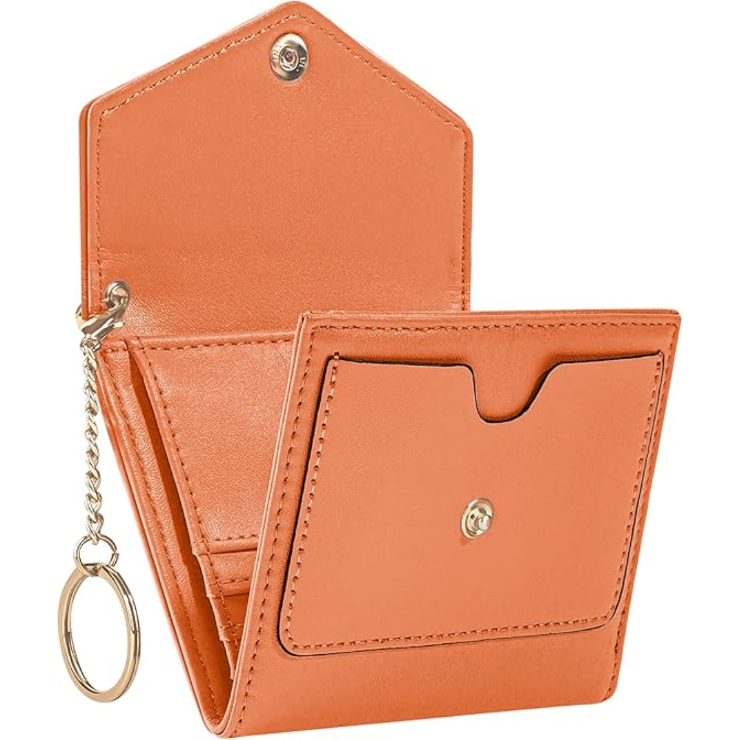 Orangefarbene Leder-Geldbörse mit Schlüsselanhänger, kompakt, stilvoll, Damen-Accessoire.