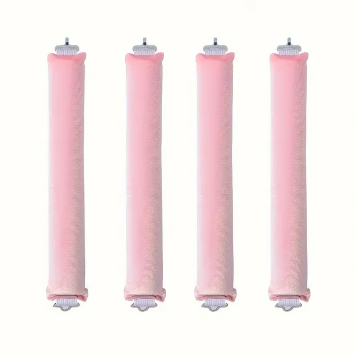 Vier rosa Wasserfilterkartuschen, zylindrisch, für Trinkwasseraufbereitung, umweltfreundlich.