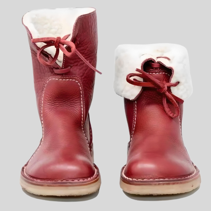 Rote Lederstiefel mit weißem Fellfutter, Damen-Wintermode, warme Winterschuhe.