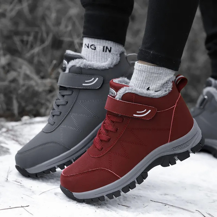 Graue und rote Winterstiefel, wasserdicht, rutschfest, warm gefüttert, Outdoor-Schuhe.