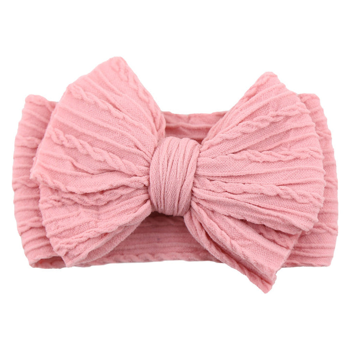 Rosa Baby-Stirnband aus Baumwolle mit Schleife, gestrickt, modisches Accessoire für Mädchen.