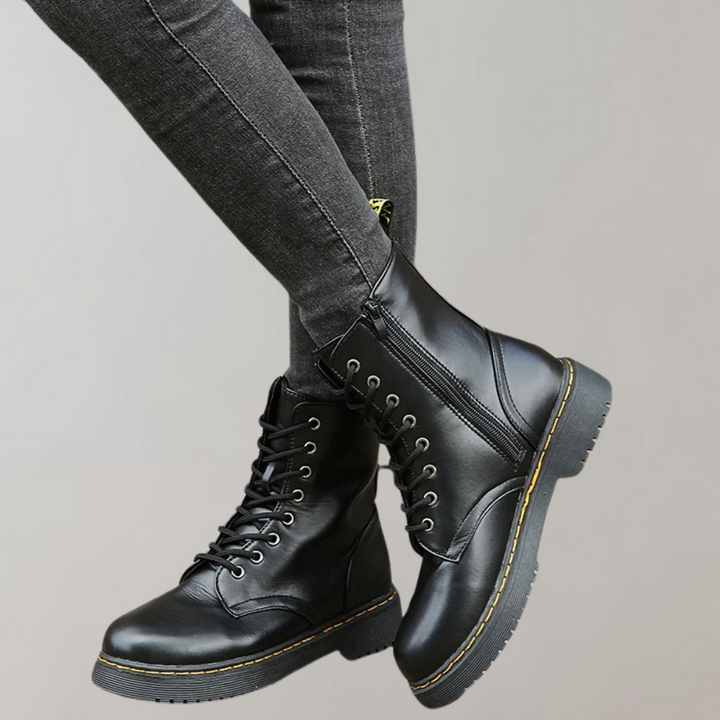 Schwarze Damenstiefel aus Leder, Schnürung, Reißverschluss, robuste Sohle, modisch, bequem.
