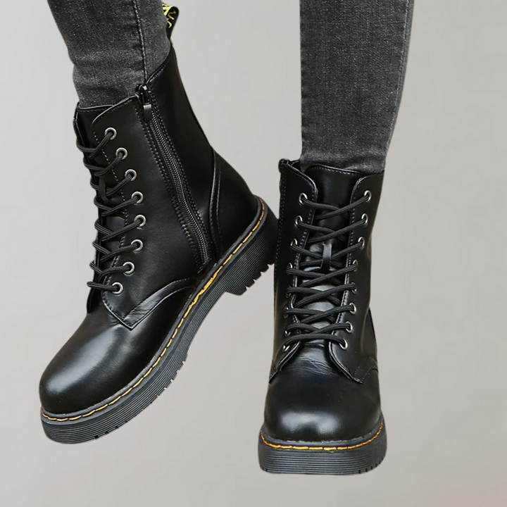 Schwarze Damenstiefel aus Leder, Schnürung, Reißverschluss, robuste Sohle, modisch, bequem.