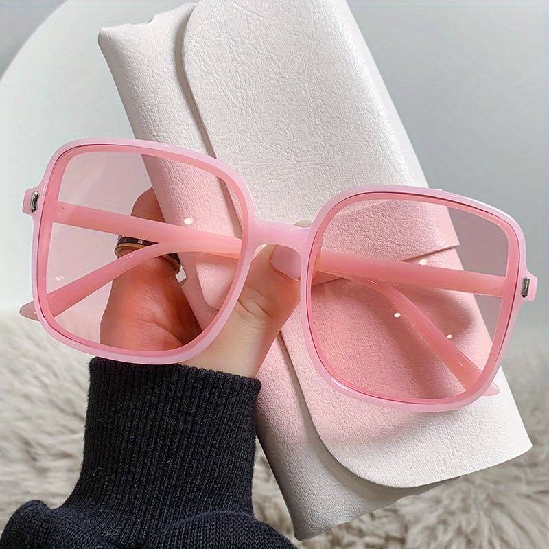 Rosa übergroße quadratische Sonnenbrille, modisch, Damen-Accessoire, trendig.