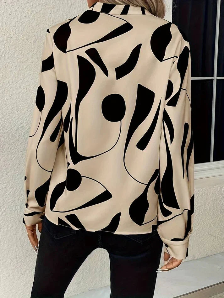 Beige Bluse mit schwarzem abstraktem Muster, Damenmode, Langarm, elegant, modern.