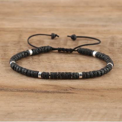 Schwarzes Perlenarmband mit verstellbarem Verschluss, handgefertigt, Unisex-Schmuck.