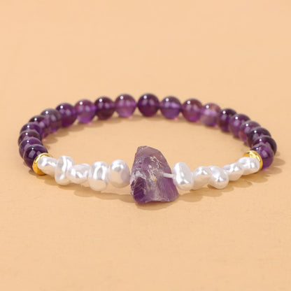 Armband aus Amethyst und Perlen, lila und weiß, Schmuck für Damen, Edelstein-Accessoire.