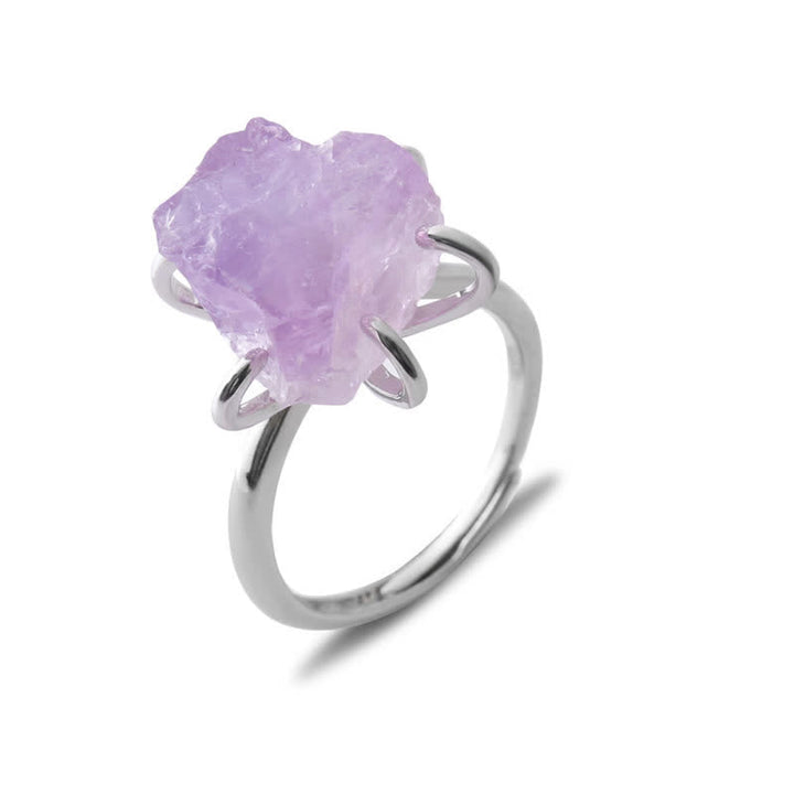 Silberring mit rohem Amethyst, lila Edelstein, handgefertigter Schmuck, einzigartiges Design.