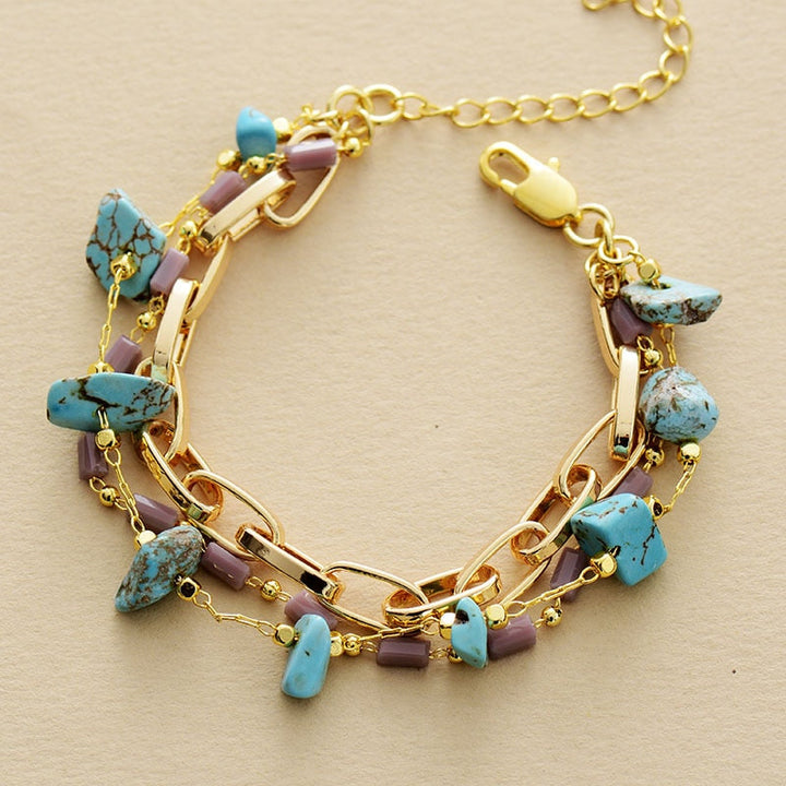 Goldenes Armband mit türkisfarbenen Steinen und Kettengliedern, Damen Schmuck, Geschenkidee.