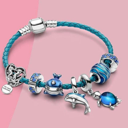 Blaue Charm-Armband mit Meeresmotiven, Delfin, Wal, Krabbe, geflochtenes Leder, Damen-Schmuck.