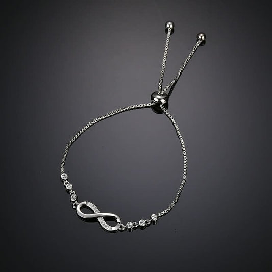 Silbernes Armband mit Unendlichkeitssymbol, verstellbar, mit Kristallen, eleganter Schmuck.