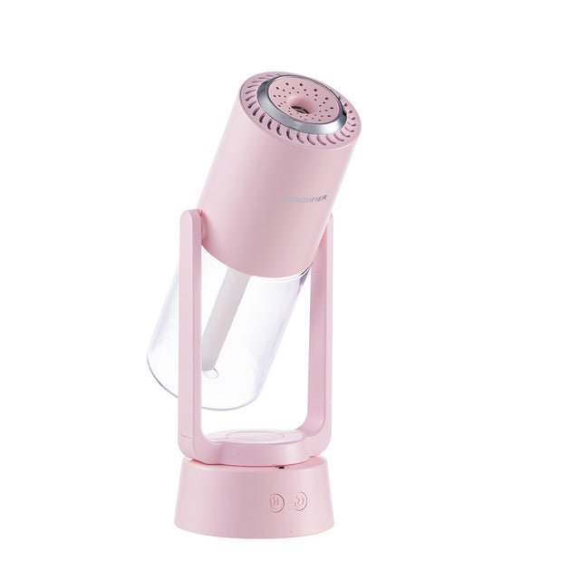 Rosa automatischer rotierender Luftbefeuchter, modernes Design, tragbar, leise.