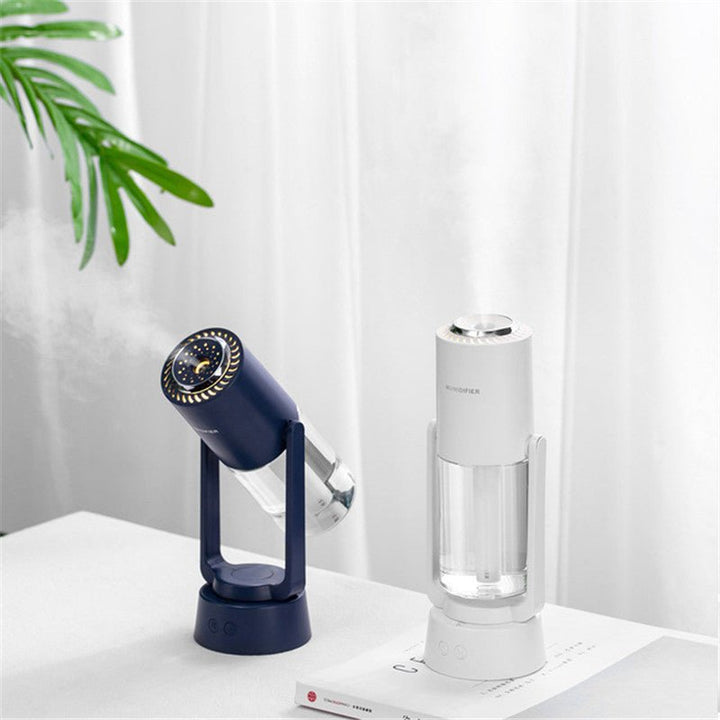 Automatischer rotierender Luftbefeuchter, blau und weiß, modernes Design, Tischgerät.