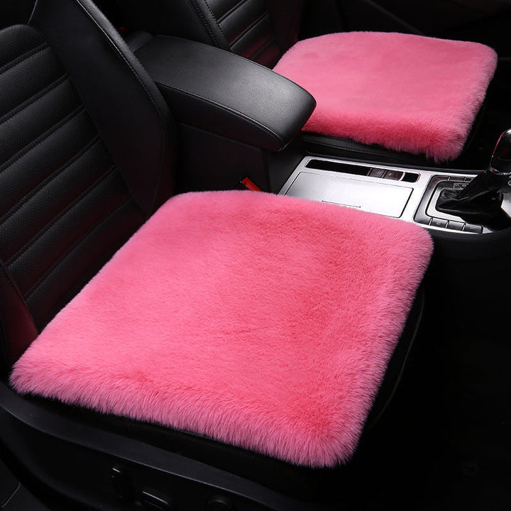 Rosa Autositzkissen aus Kunstfell, bequem, stilvoll, für Autoinnenraum, Sitzschutz.