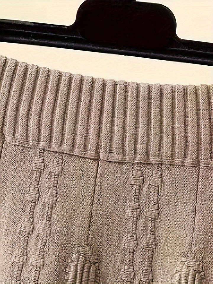 Beiger Strickrock aus Baumwolle, geripptes Bündchen, elegantes Design, Damenmode.