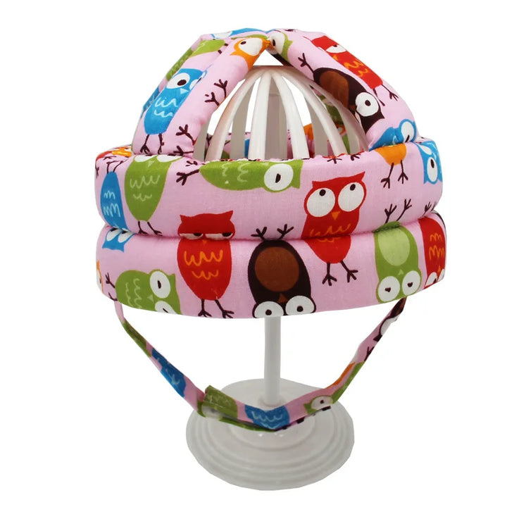 Baby-Schutzhelm mit buntem Eulenmuster, rosa Stoff, verstellbar, Sicherheitshelm für Kleinkinder.