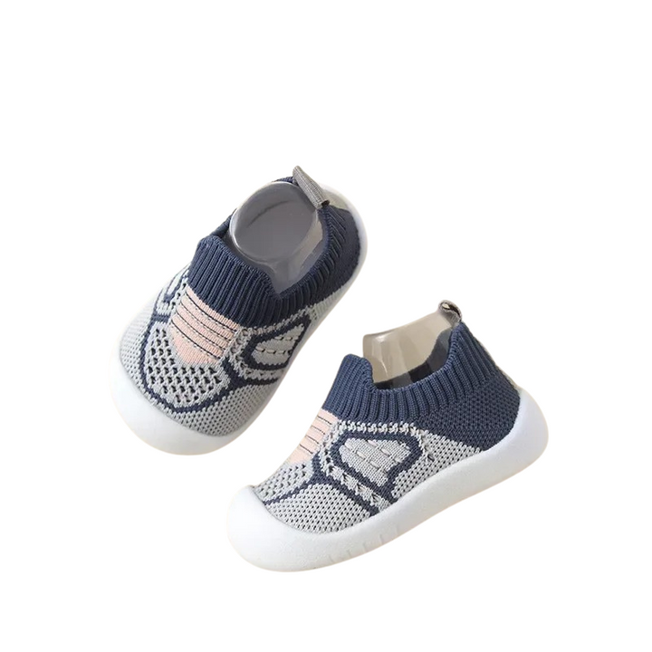 Blaue Babyschuhe aus Strick mit weißer Sohle, rutschfest, bequem, modisch.