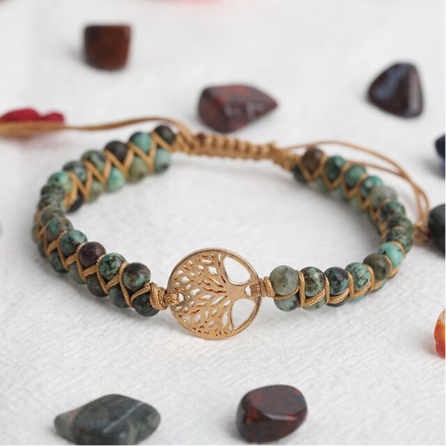 Handgefertigtes Armband mit 7 Chakra Heilsteinen, Naturstein, verstellbar, Boho-Stil.
