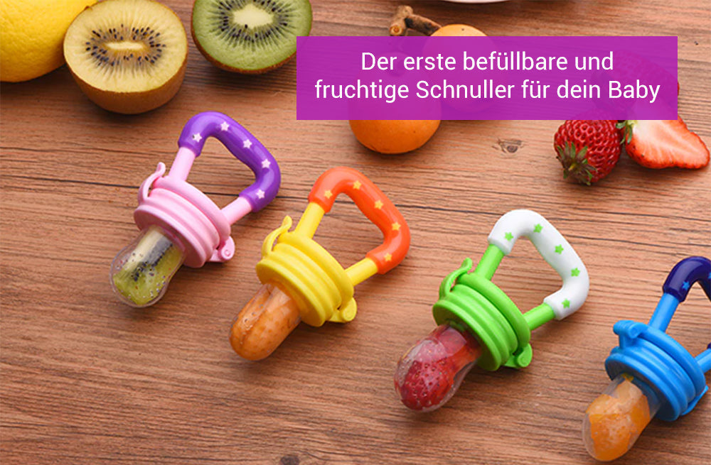 Bunte befüllbare Schnuller für Babys mit fruchtigem Inhalt auf Holztisch.