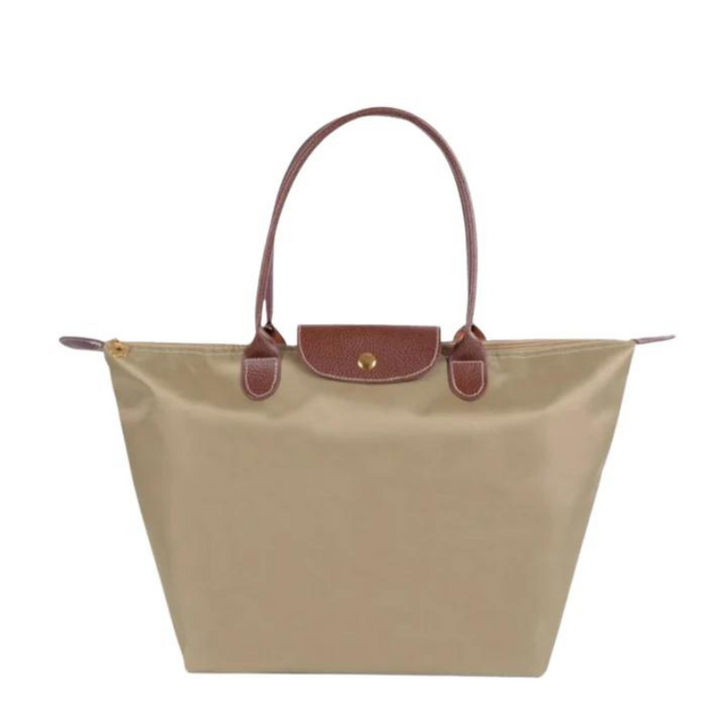 Beige Damenhandtasche aus Nylon mit braunen Ledergriffen, stilvoll und geräumig.