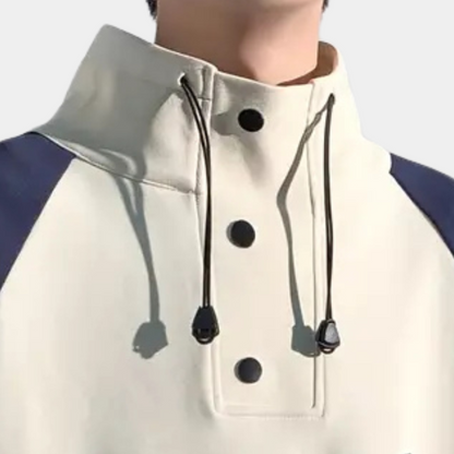 Beige Kapuzenpullover mit schwarzen Knöpfen und Kordeln, sportlich, Unisex, Baumwolle.