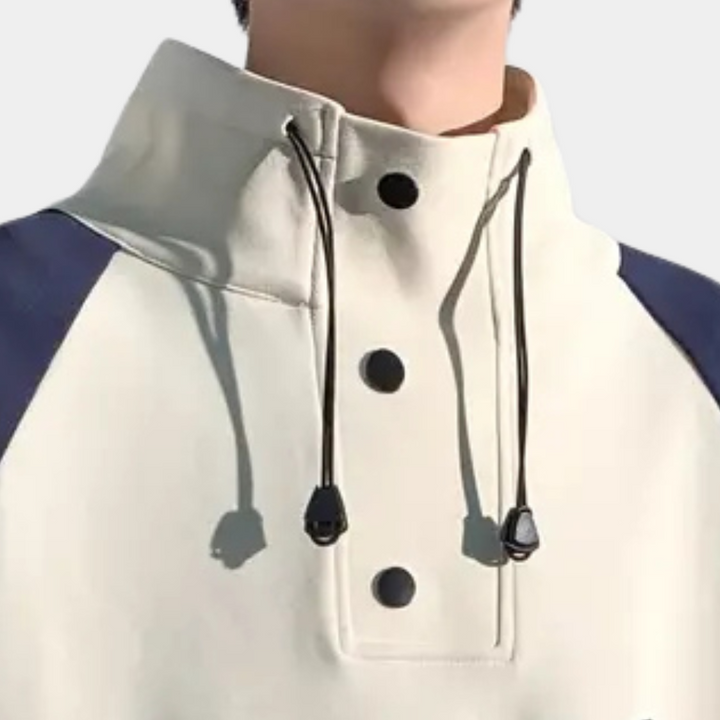 Beige Kapuzenpullover mit schwarzen Knöpfen und Kordeln, sportlich, Unisex, Baumwolle.