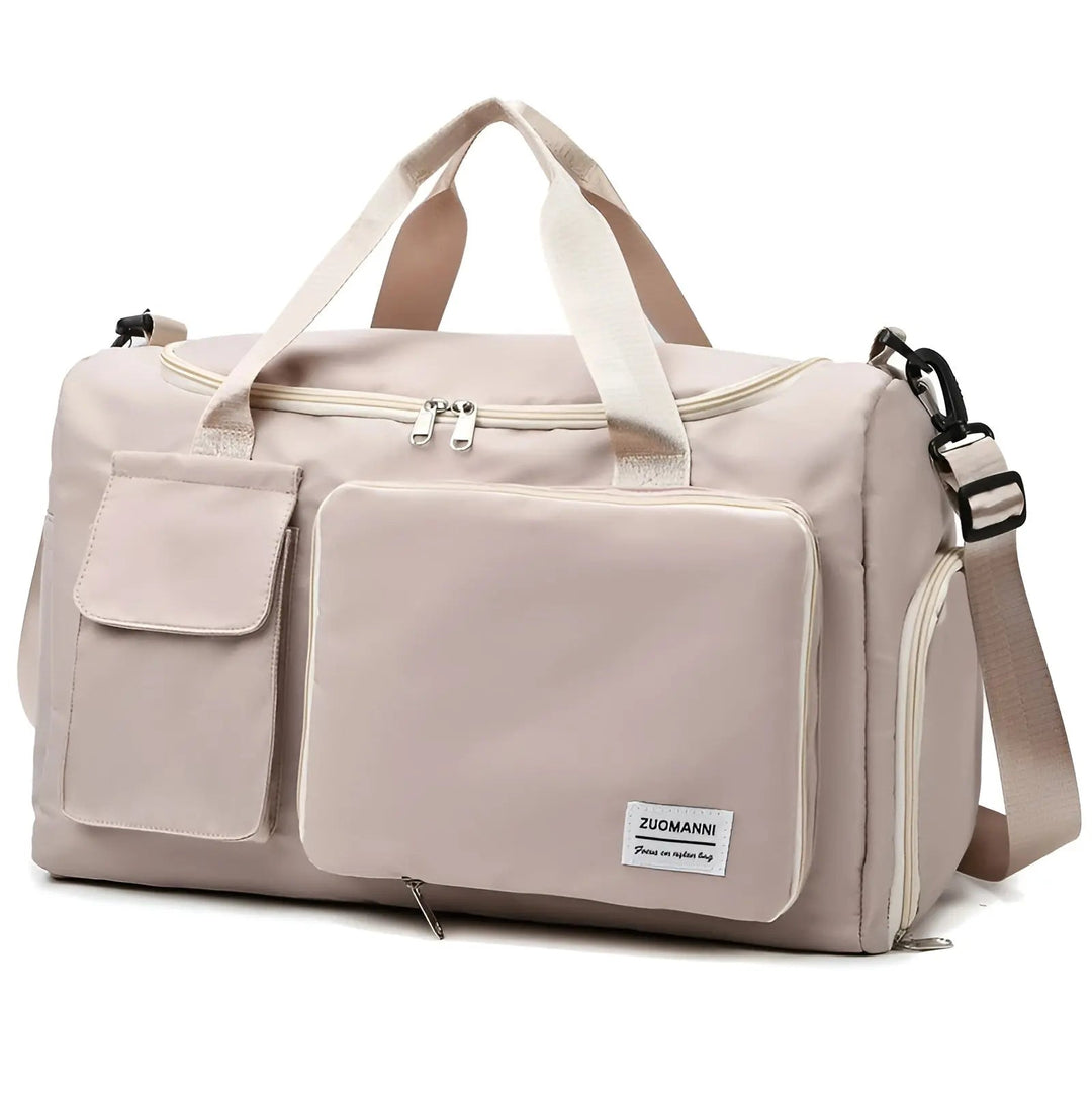 Beige Reisetasche aus Nylon mit mehreren Fächern und verstellbarem Schultergurt.