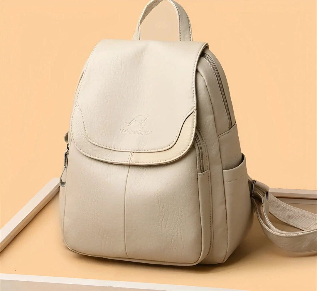 Beiger Damenrucksack aus Leder, stilvoll und praktisch, ideal für Alltag und Reisen.