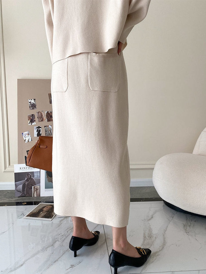 Damen Strickrock beige, knielang, mit Taschen, elegantes Design, Herbstmode, Büro-Outfit.