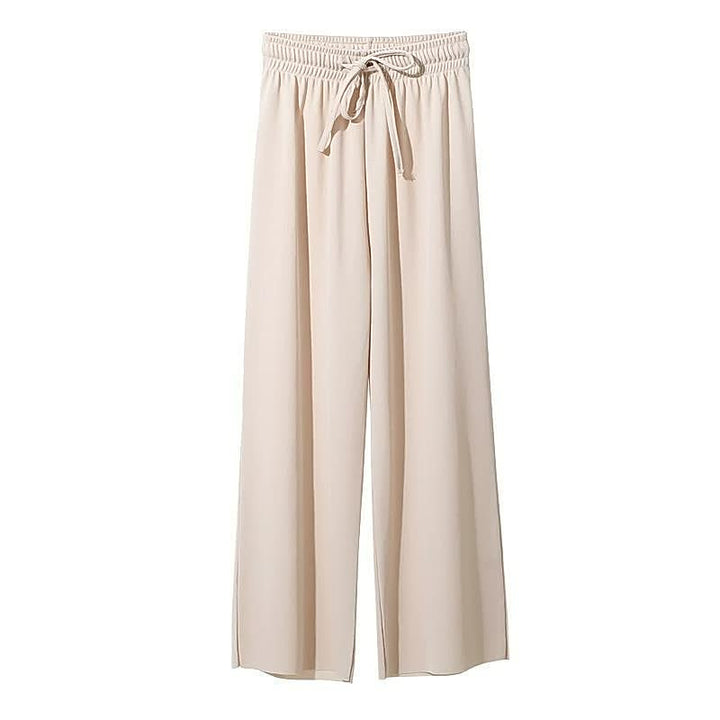 Beige Damenhose mit weitem Bein, elastischem Bund und Kordelzug, lässige Sommermode.