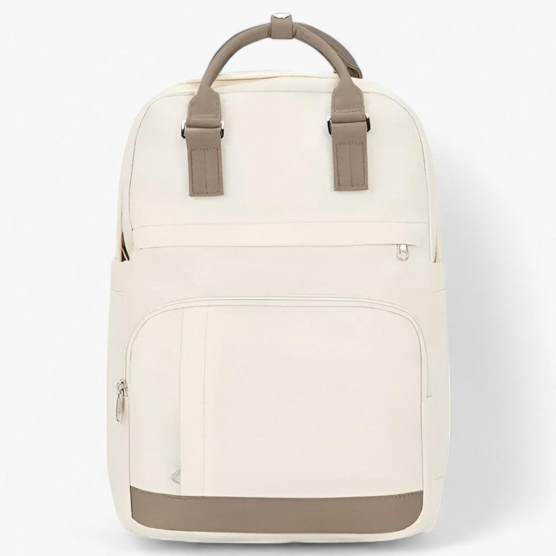 Beiger Rucksack aus Canvas mit braunen Ledergriffen, Fronttasche, Reißverschluss, Unisex-Design.