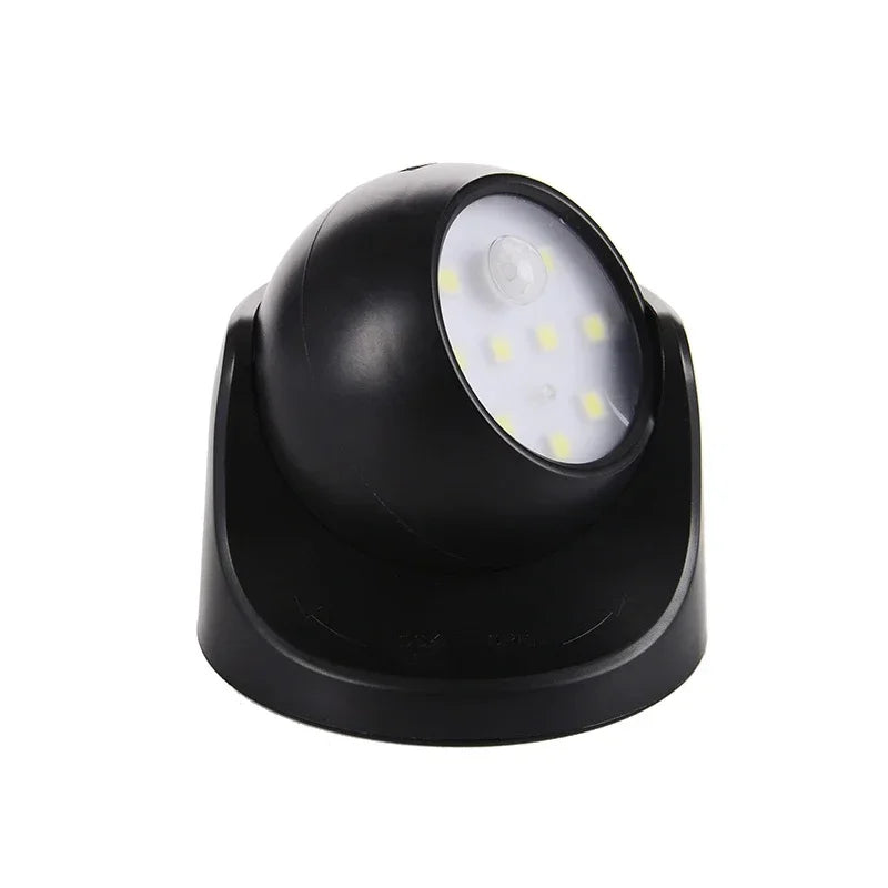 Schwarze LED-Sicherheitskamera-Attrappe mit Bewegungssensor für den Außenbereich.