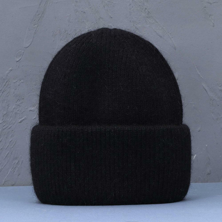 Schwarze Strickmütze aus Wolle, unisex, warm, modisch, ideal für Winter, Freizeitkleidung.
